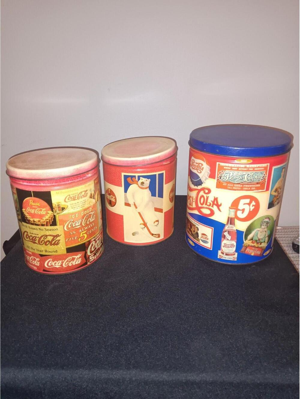 3 Vintage-style Metal Tin Canisters Featuring Coca-Cola and Pepsi branding.